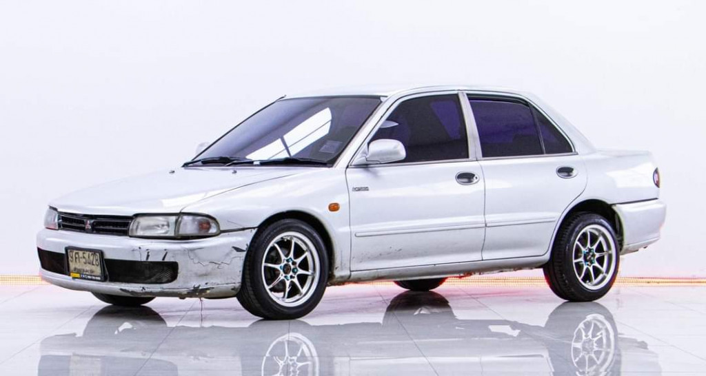 รถมือสอง MITSUBISHI LANCER 1995 ขายอยู่บนเว็บไซต์ตลาดรถออนไลน์ GUCARS